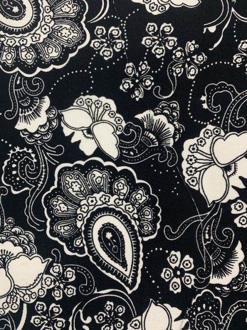 Tissu coton fleuri noir à motifs blancs à petit prix - Cuirtex